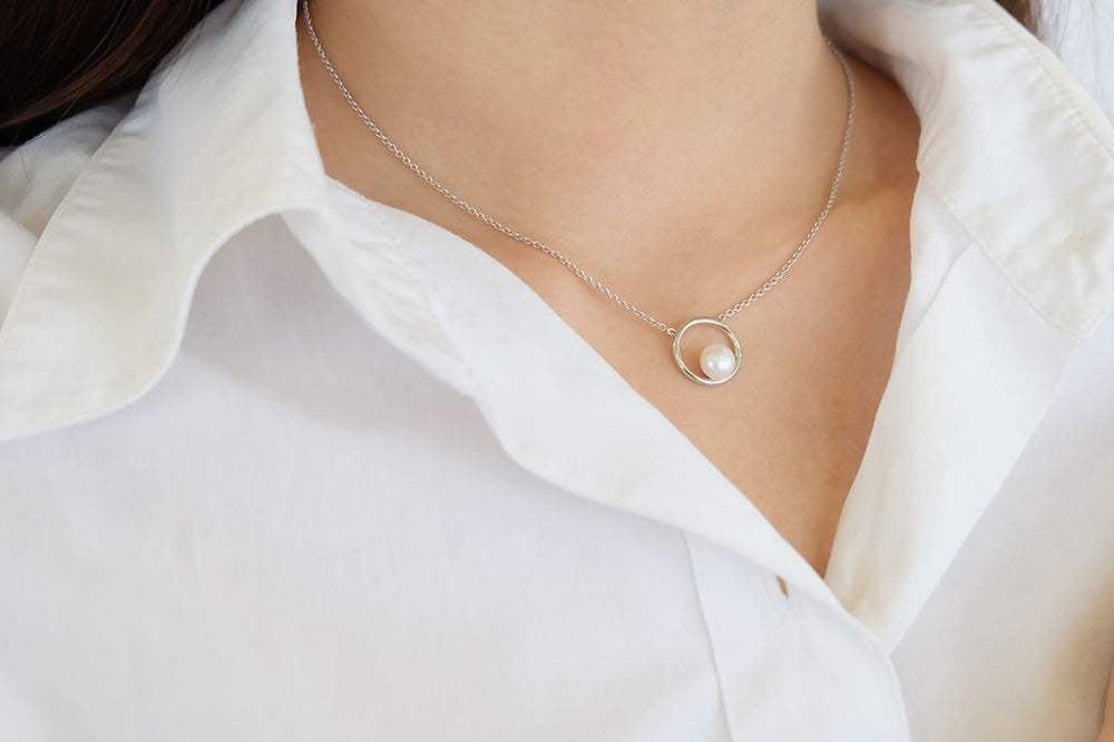 Saturn Pearl Necklace